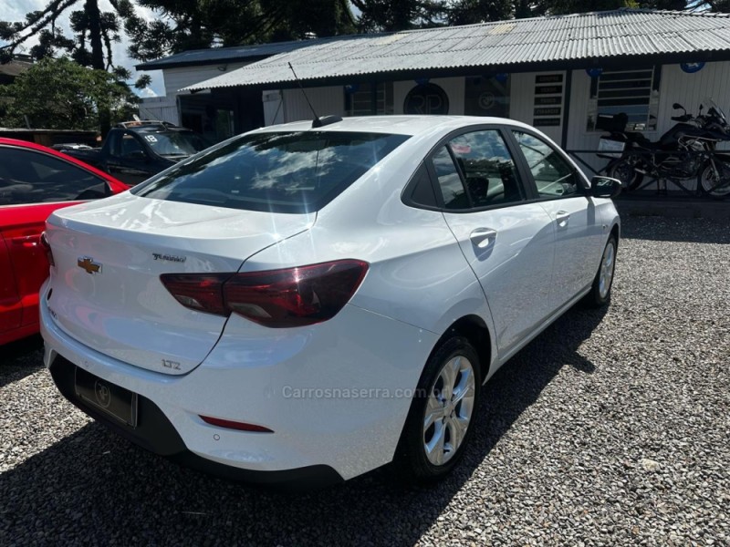 ONIX 1.0	LTZ PLUS 8V TURBO FLEX 4P AUTOMÁTICO - 2023 - CANELA