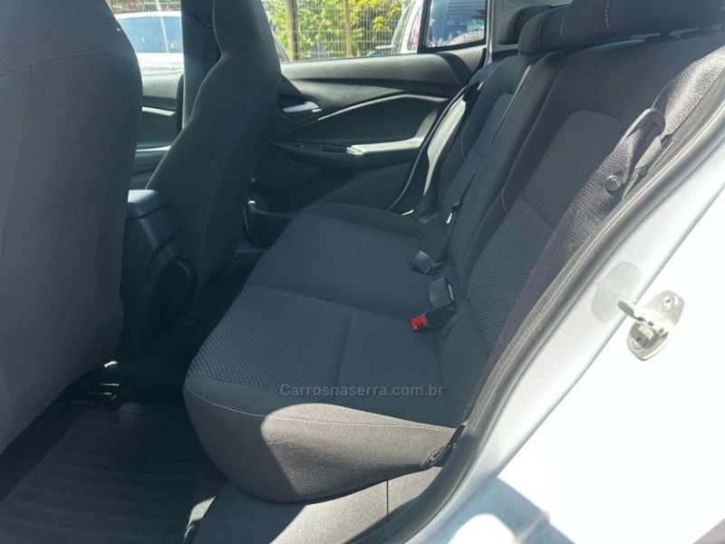 ONIX 1.0	LTZ PLUS 8V TURBO FLEX 4P AUTOMÁTICO - 2023 - CANELA