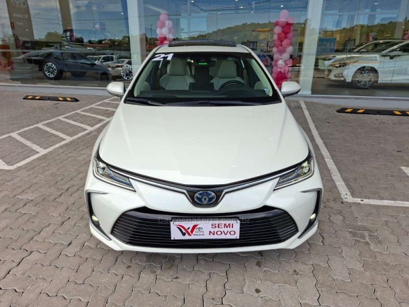 corolla 1.8 altis premium 16v hibrido 4p automatico 2021 bento goncalves