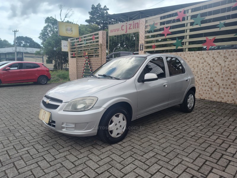 celta 1.0 mpfi lt 8v flex 4p manual 2013 canela