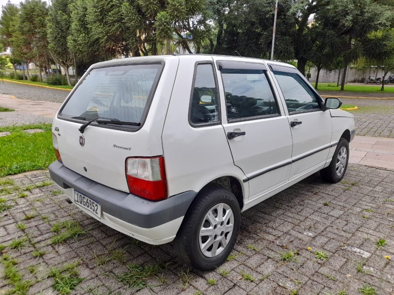 UNO 1.0 MPI MILLE FIRE ECONOMY 8V FLEX 4P MANUAL - 2010 - FARROUPILHA
