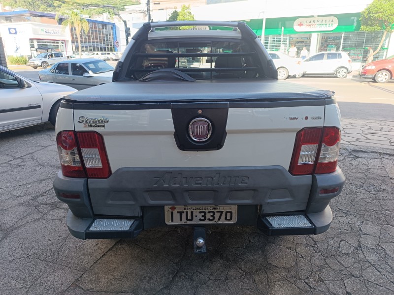 STRADA 1.8 MPI ADVENTURE LOCKER CE 8V FLEX 2P MANUAL - 2013 - FLORES DA CUNHA