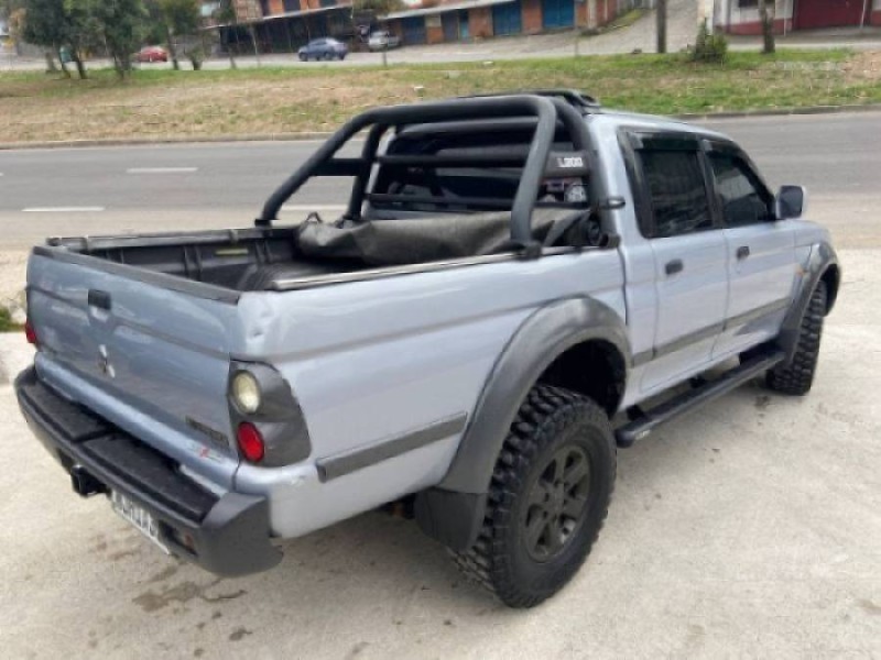 L200 OUTDOOR 2.5 GLS 4X4 CD 8V TURBO INTERCOOLER DIESEL 4P MANUAL - 2010 - CAXIAS DO SUL