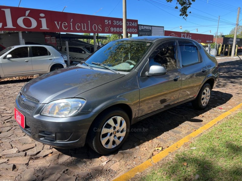 prisma 1.4 mpfi lt 8v flex 4p manual 2012 dois irmaos