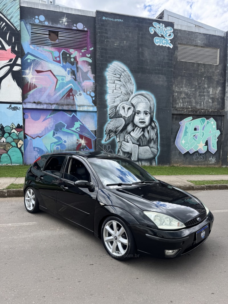 focus 2.0 ghia 16v gasolina 4p manual 2006 caxias do sul