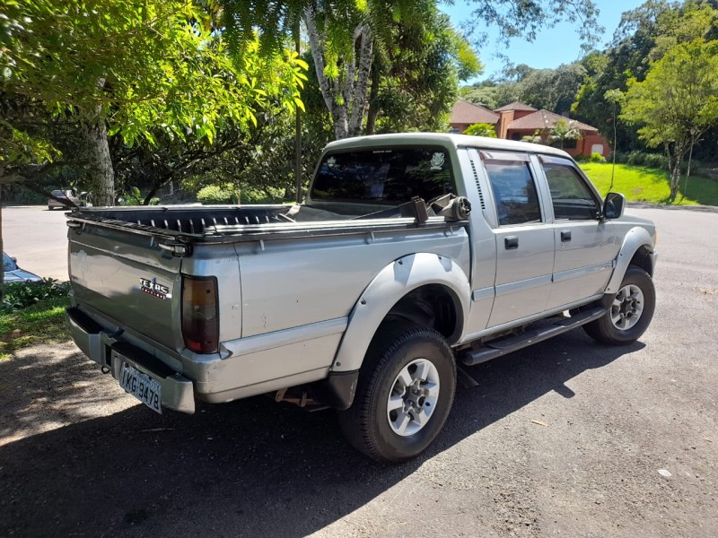 L200 2.5 GLS 4X4 CD 8V TURBO DIESEL 4P MANUAL - 2002 - FARROUPILHA