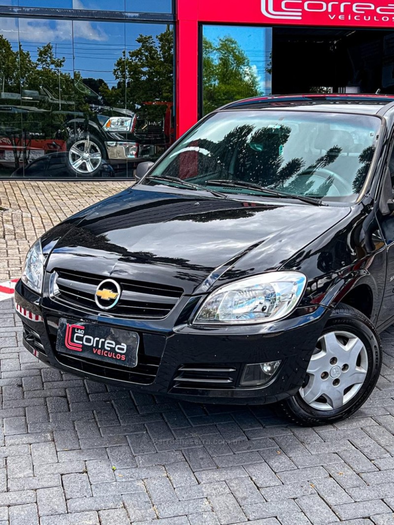 CELTA 1.0 MPFI SPIRIT 8V FLEX 4P MANUAL - 2009 - CANELA