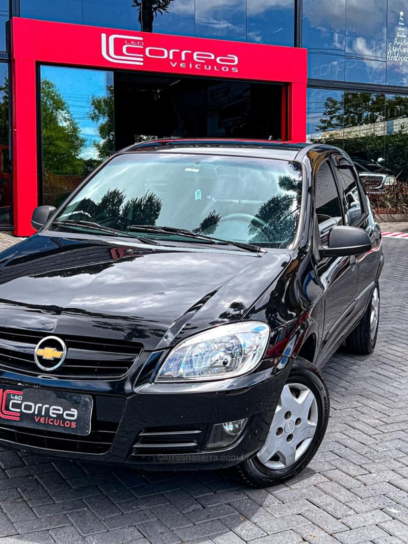 CELTA 1.0 MPFI SPIRIT 8V FLEX 4P MANUAL - 2009 - CANELA