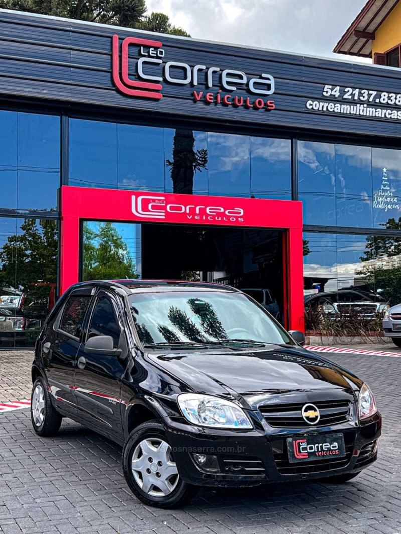 celta 1.0 mpfi spirit 8v flex 4p manual 2009 canela