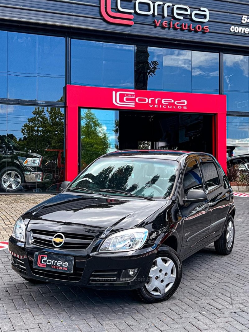 CELTA 1.0 MPFI SPIRIT 8V FLEX 4P MANUAL - 2009 - CANELA