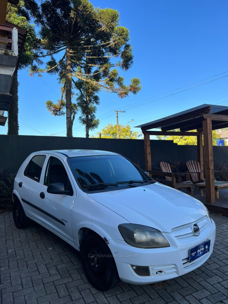 celta 1.0 mpfi spirit 8v flex 4p manual 2009 canela