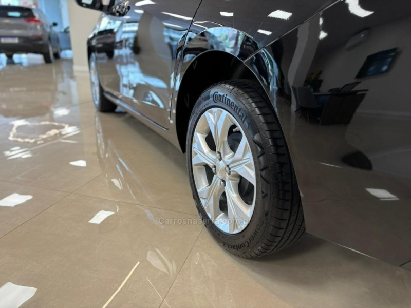 ONIX 1.0	PREMIER PLUS 12V TURBO FLEX 4P AUTOMÁTICO - 2021 - CARLOS BARBOSA