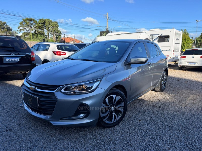 onix 1.0 premier 12v turbo flex 4p automatico 2024 canela