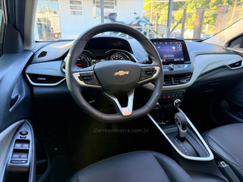 ONIX 1.0 PREMIER 12V TURBO FLEX 4P AUTOMÁTICO - 2024 - CANELA