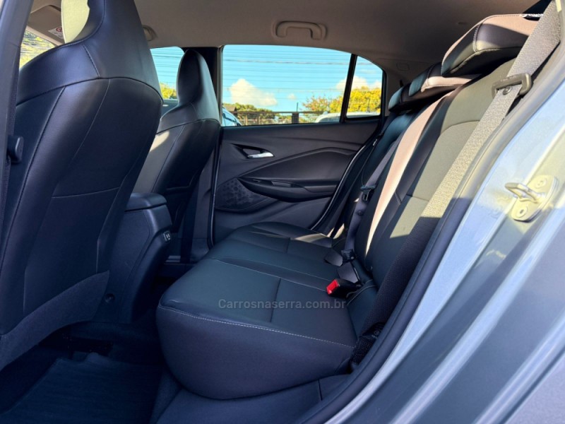 ONIX 1.0 PREMIER 12V TURBO FLEX 4P AUTOMÁTICO - 2024 - CANELA