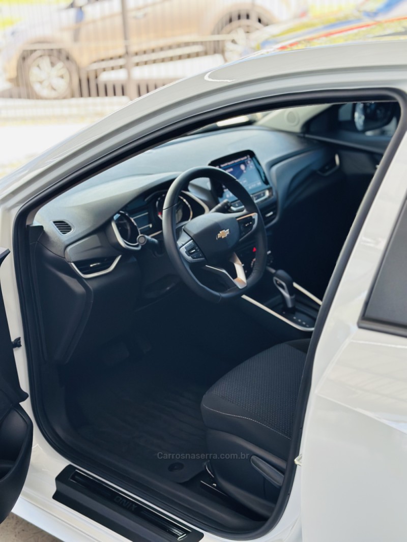 ONIX 1.0	LTZ PLUS 12V TURBO FLEX 4P AUTOMÁTICO - 2024 - CANELA