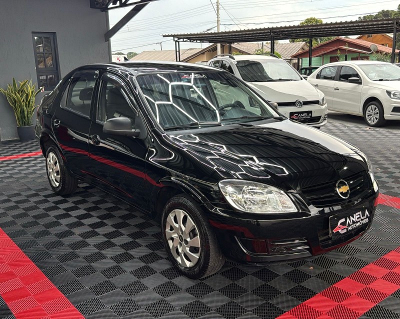 PRISMA 1.4 MPFI MAXX 8V FLEX 4P MANUAL - 2011 - CANELA