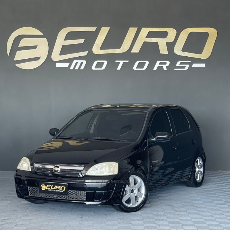 corsa 1.4 mpfi premium 8v flex 4p manual 2010 portao