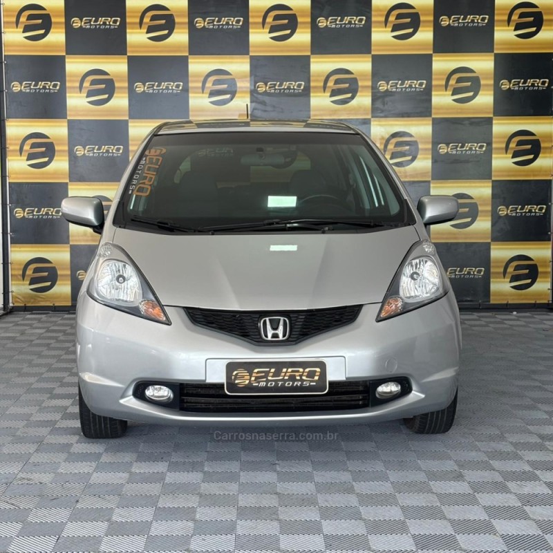 FIT 1.4 LX 16V FLEX 4P MANUAL - 2009 - PORTãO