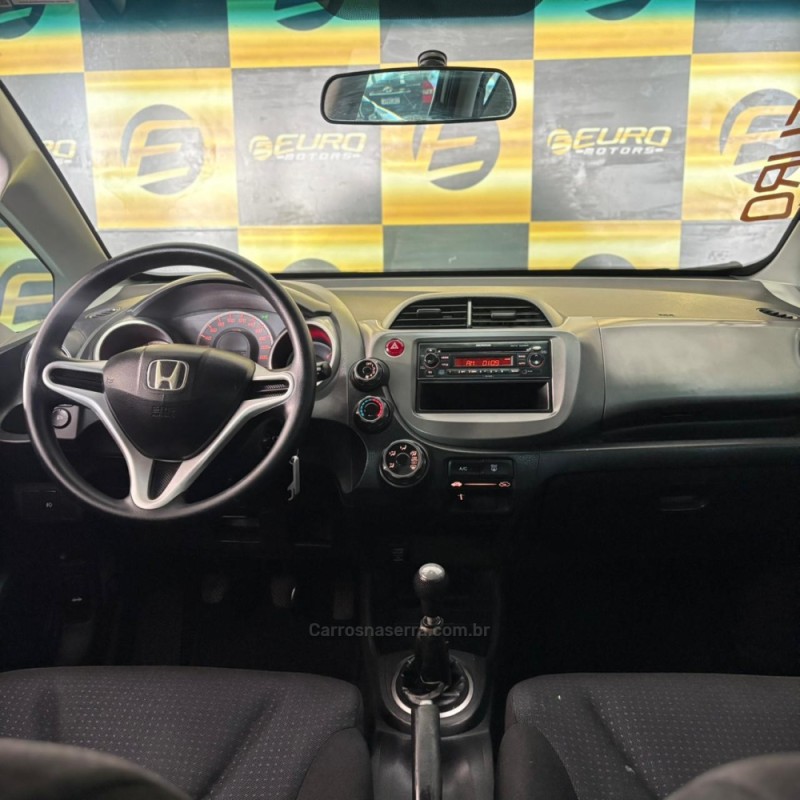 FIT 1.4 LX 16V FLEX 4P MANUAL - 2009 - PORTãO