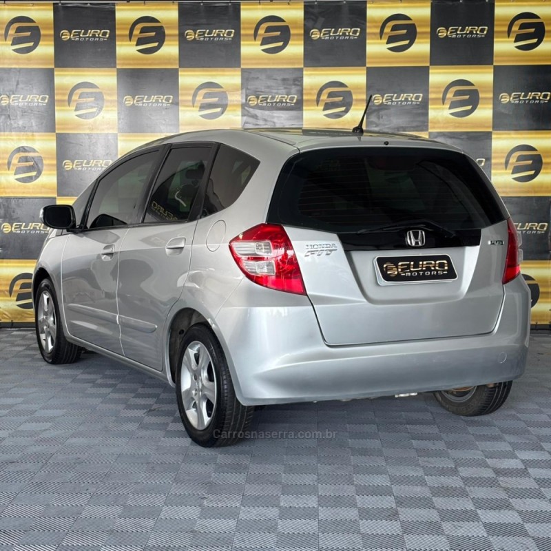 FIT 1.4 LX 16V FLEX 4P MANUAL - 2009 - PORTãO