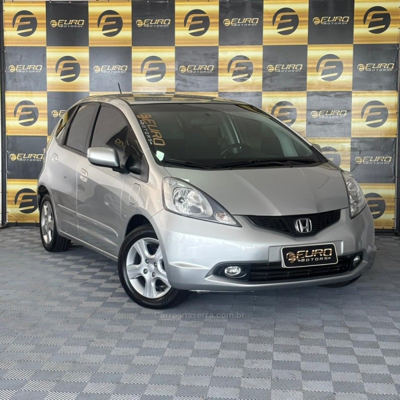 FIT 1.4 LX 16V FLEX 4P MANUAL - 2009 - PORTãO