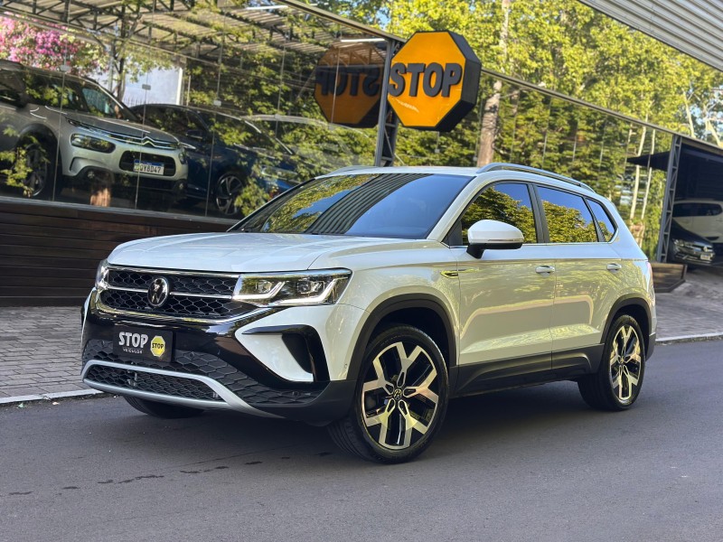 taos 1.4 16v highline tsi flex 4p automatico 2024 dois irmaos