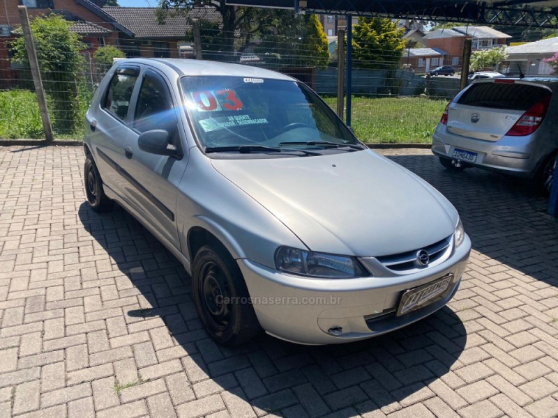 CELTA 1.0 MPFI VHC SUPER 8V GASOLINA 4P MANUAL - 2003 - CANELA