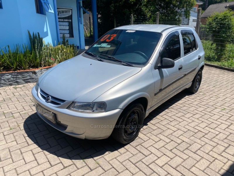 celta 1.0 mpfi vhc super 8v gasolina 4p manual 2003 canela