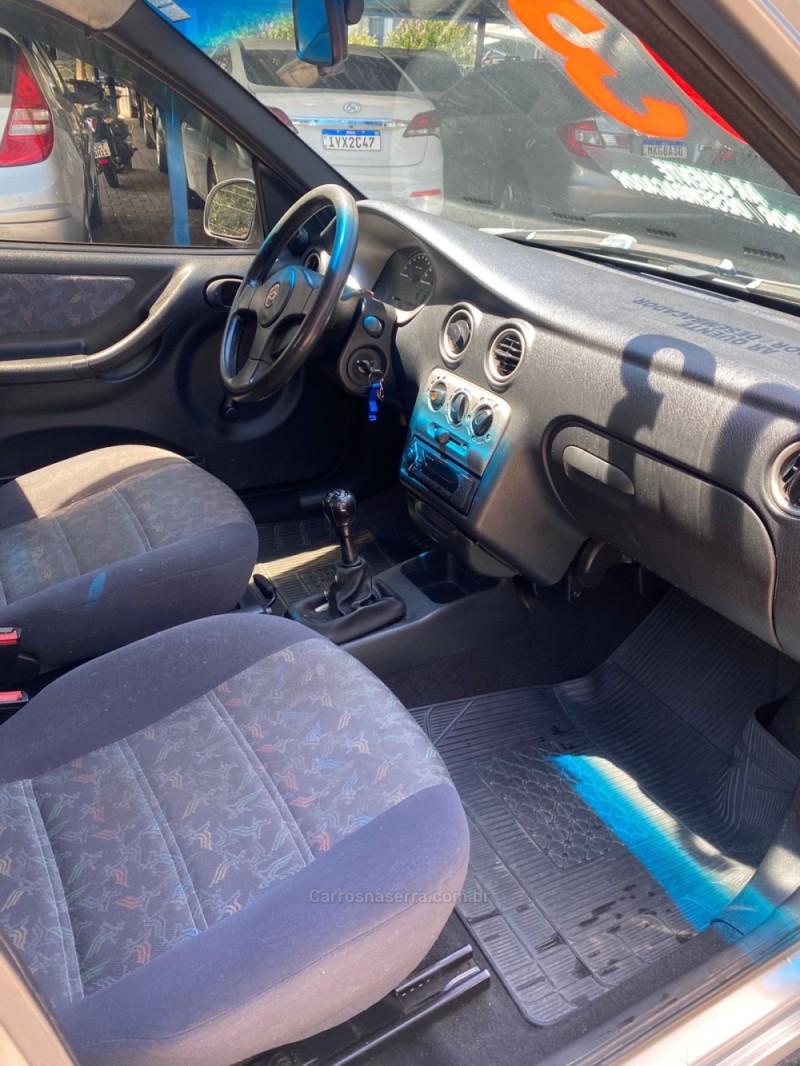 CELTA 1.0 MPFI VHC SUPER 8V GASOLINA 4P MANUAL - 2003 - CANELA