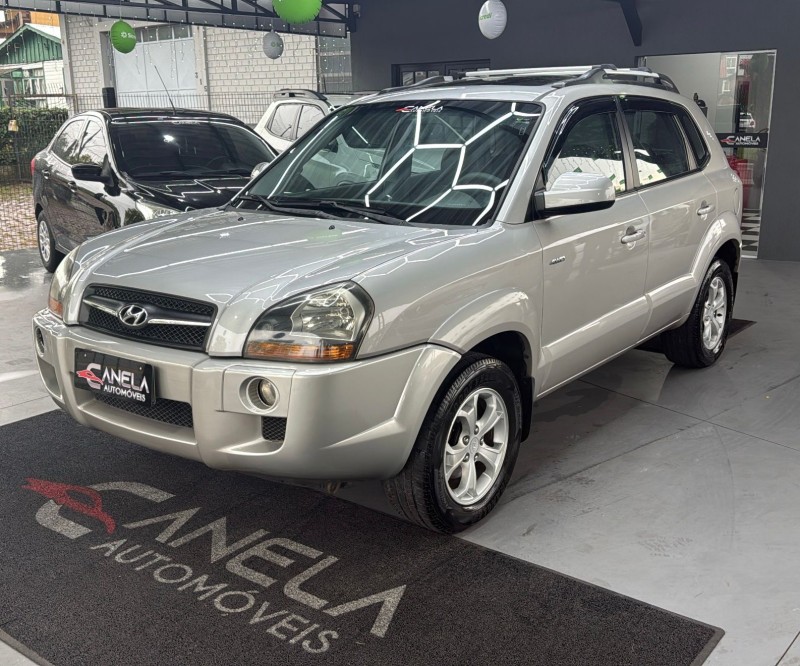 tucson 2.7 mpfi gls 24v 180cv 4wd gasolina 4p automatico 2009 canela