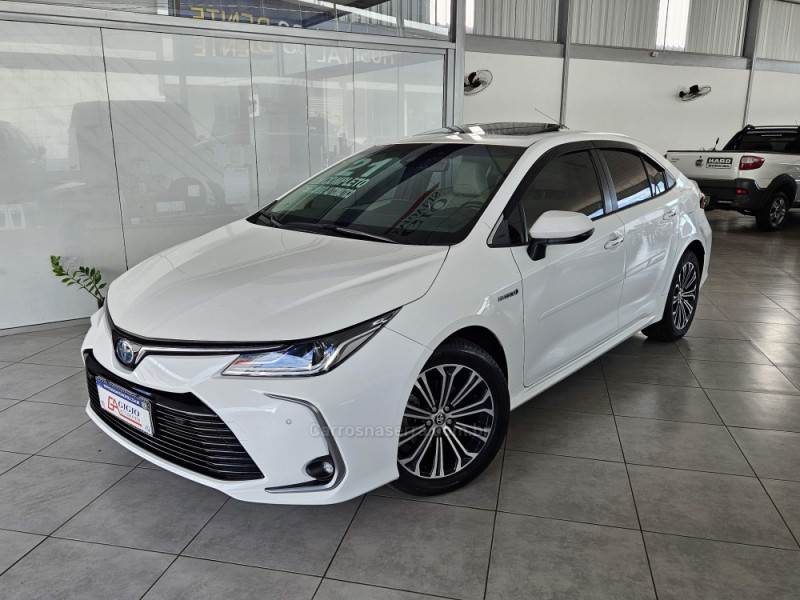 COROLLA 1.8 ALTIS PREMIUM 16V HÍBRIDO 4P AUTOMÁTICO - 2021 - TAPEJARA