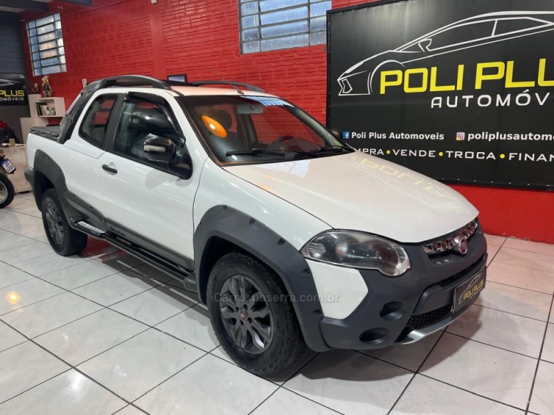 strada 1.8 mpi adventure cd 16v flex 2p automatizado 2013 caxias do sul