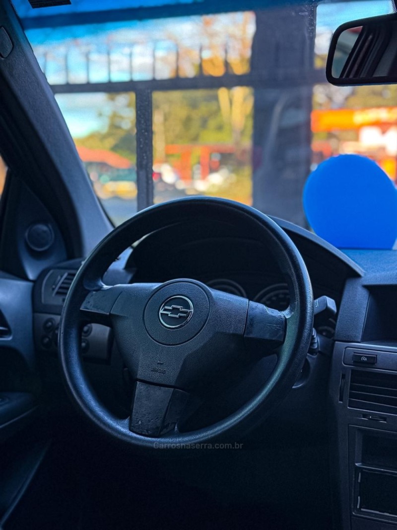 VECTRA 2.0 MPFI GT HATCH 8V FLEX 4P MANUAL - 2009 - CANELA