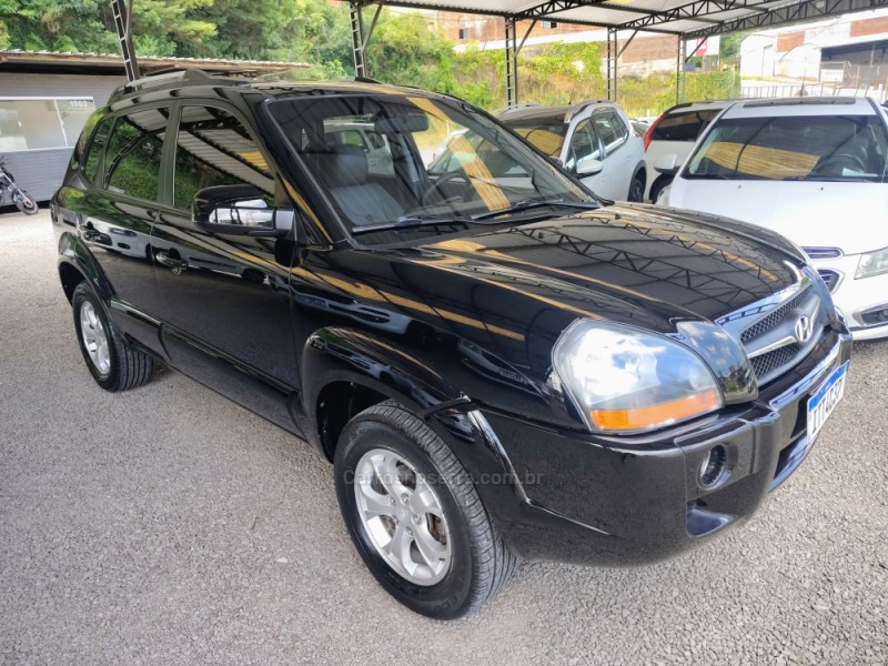 tucson 2.0 mpfi gls 16v 143cv 2wd gasolina 4p automatico 2013 caxias do sul