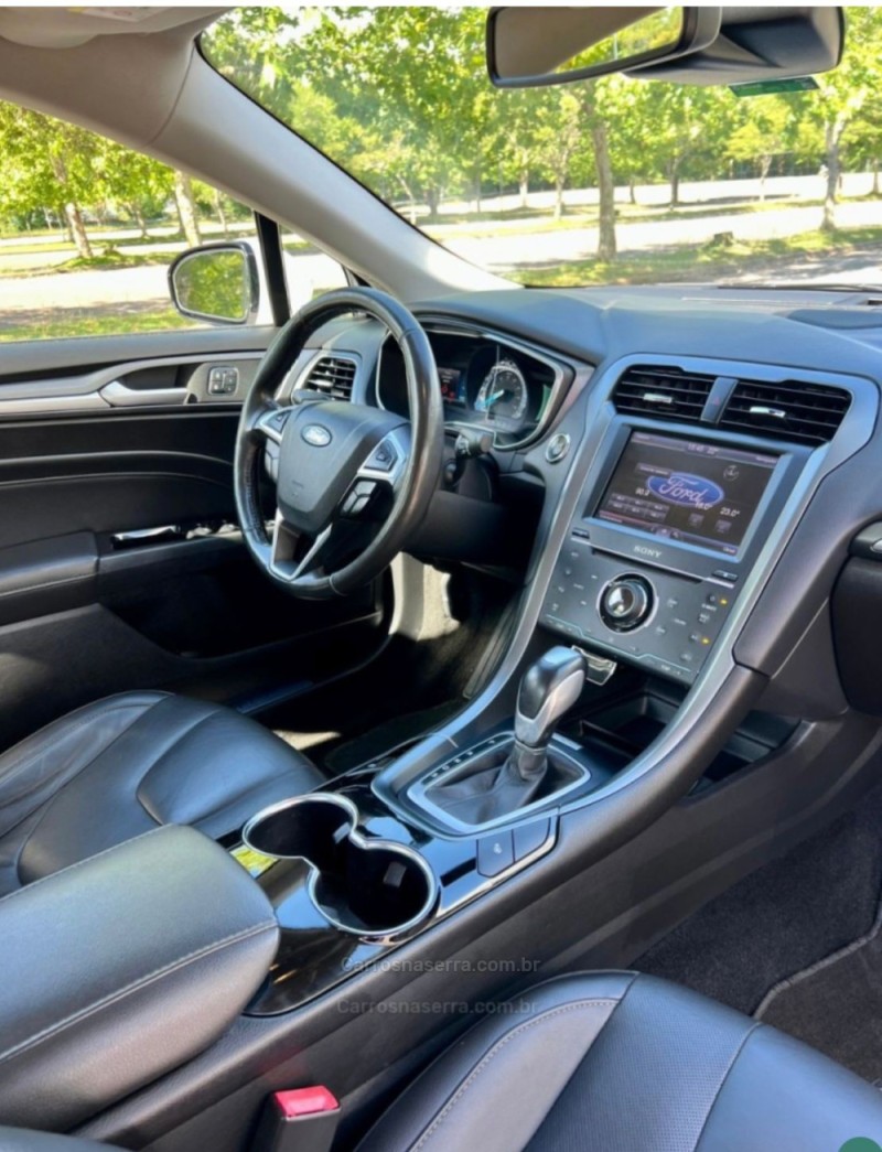 FUSION 2.0 TITANIUM AWD 16V GASOLINA 4P AUTOMÁTICO - 2014 - FARROUPILHA