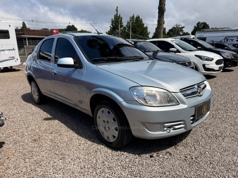 PRISMA 1.4 MPFI MAXX 8V FLEX 4P MANUAL - 2011 - CANELA
