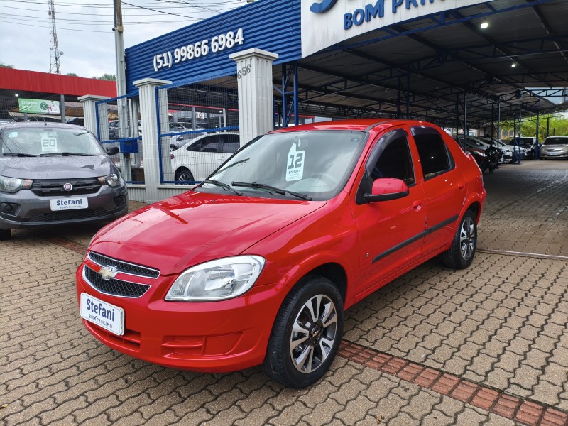 prisma 1.4 mpfi lt 8v flex 4p manual 2012 bom principio