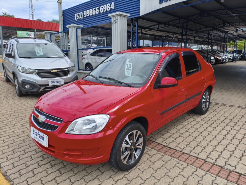 prisma 1.4 mpfi lt 8v flex 4p manual 2012 bom principio
