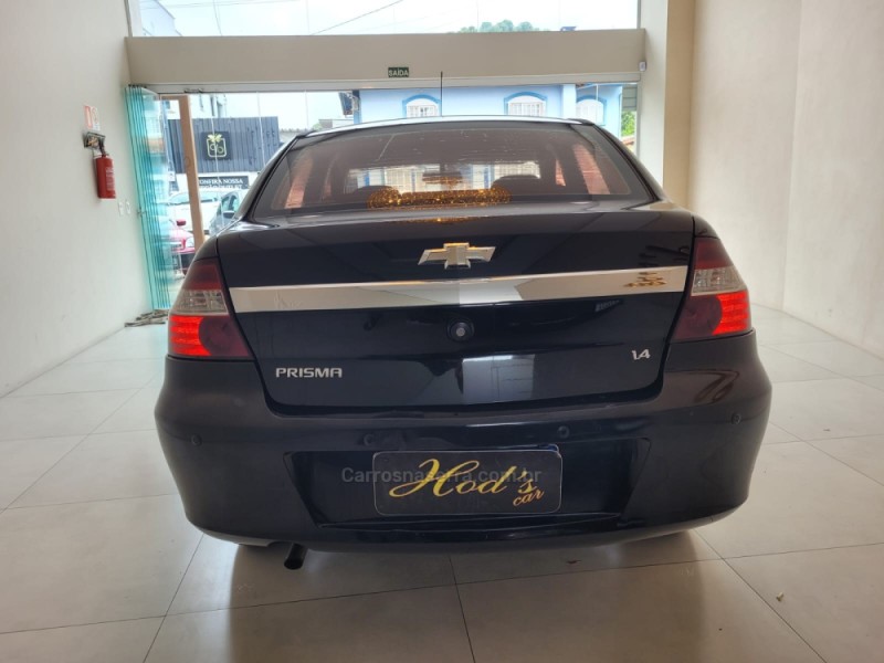 PRISMA 1.4 MPFI LT 8V FLEX 4P MANUAL - 2012 - CANELA