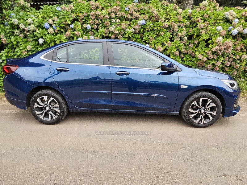 CHEVROLET - ONIX - 2023/2024 - Azul - R$ 100.000,00