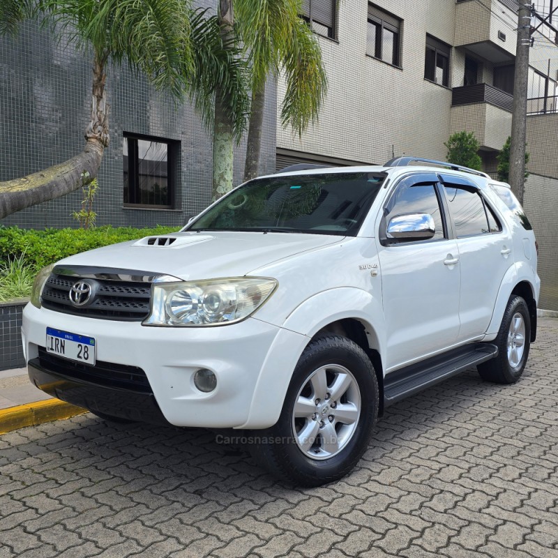 hilux sw4 2.8 srx 4x4 7 lugares 16v turbo intercooler diesel 4p automatico 2011 bento goncalves