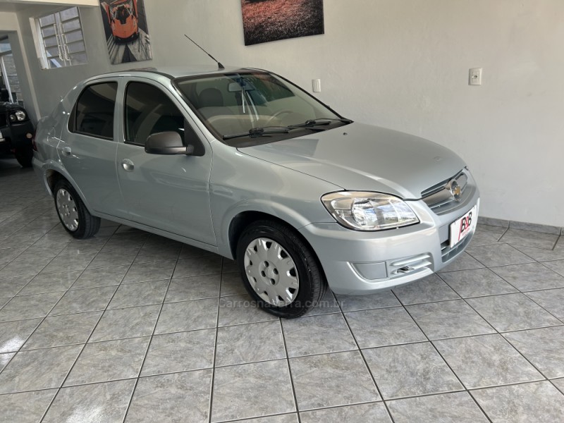 PRISMA 1.0 MPFI VHCE MAXX 8V FLEX 4P MANUAL - 2010 - NOVA PRATA