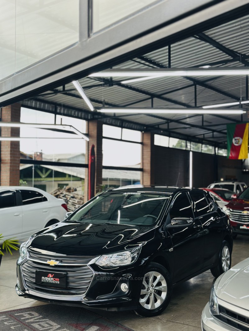 onix 1.0 lt 12v turbo flex 4p automatico 2020 canela