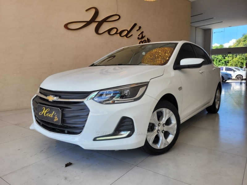 onix 1.0	premier ii plus 12v turbo flex 4p automatico 2020 canela