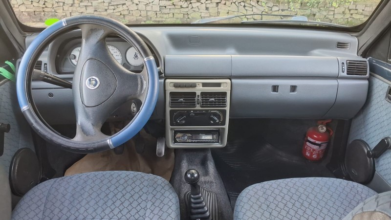 UNO 1.0 MPI MILLE FIRE ECONOMY 8V FLEX 4P MANUAL - 2003 - CAXIAS DO SUL