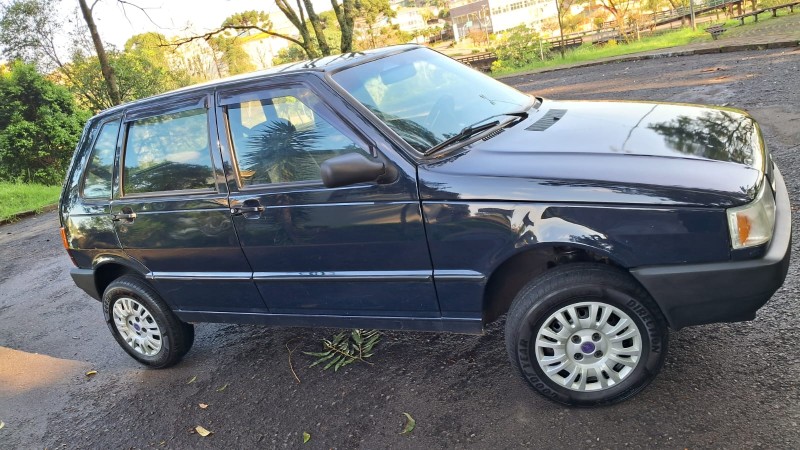 UNO 1.0 MPI MILLE FIRE ECONOMY 8V FLEX 4P MANUAL - 2003 - CAXIAS DO SUL