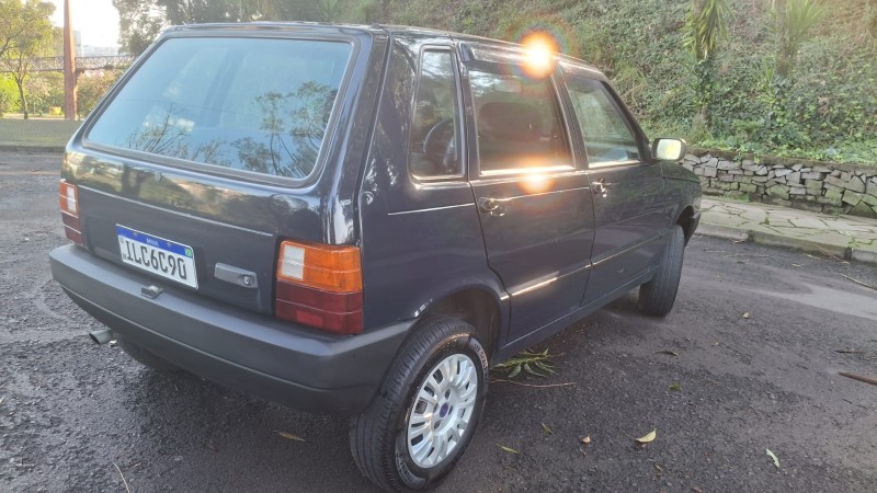 UNO 1.0 MPI MILLE FIRE ECONOMY 8V FLEX 4P MANUAL - 2003 - CAXIAS DO SUL