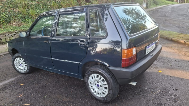 UNO 1.0 MPI MILLE FIRE ECONOMY 8V FLEX 4P MANUAL - 2003 - CAXIAS DO SUL