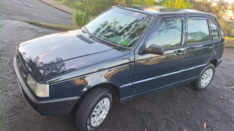 UNO 1.0 MPI MILLE FIRE ECONOMY 8V FLEX 4P MANUAL - 2003 - CAXIAS DO SUL